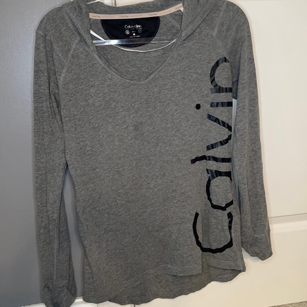 Gray Calvin Klein Ling Sleeve shirt with a hood